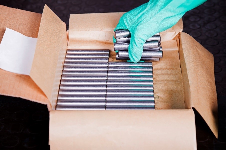 Metal rods in box